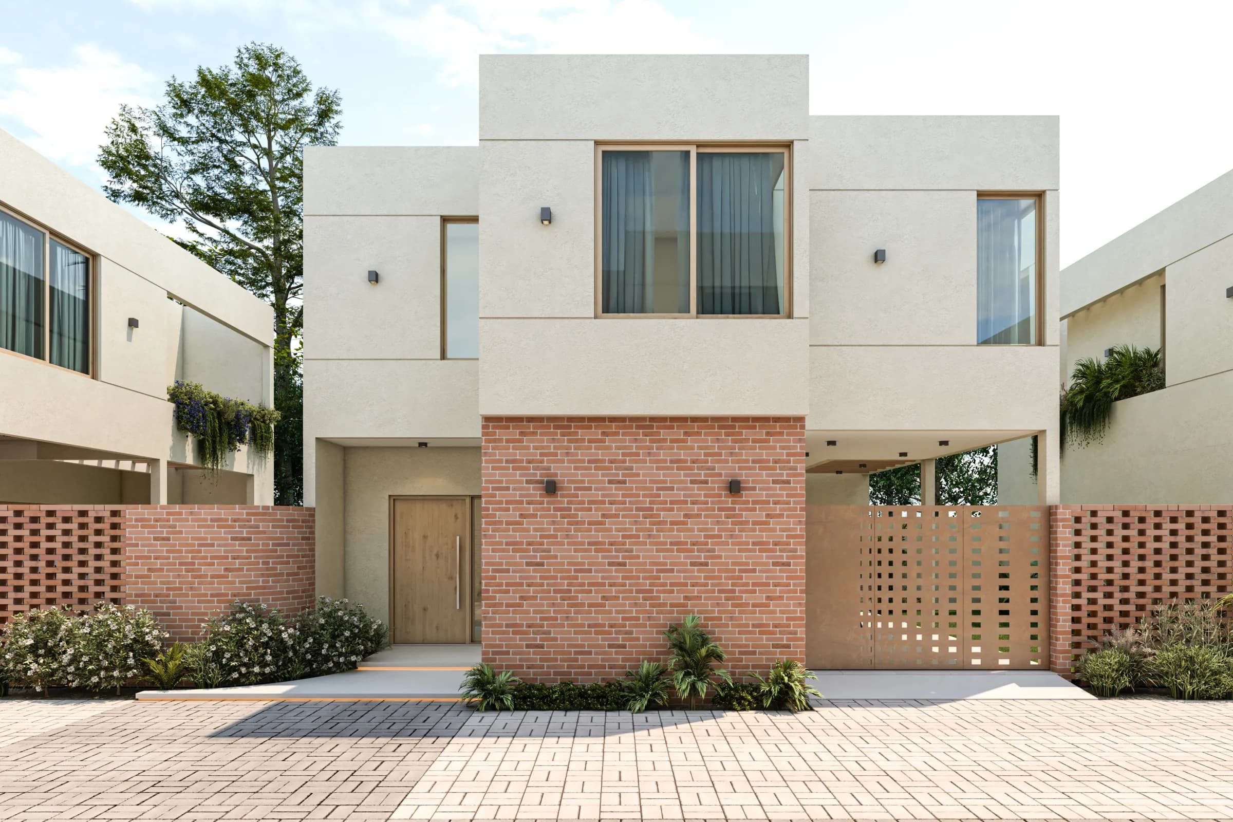 Fachada contemporánea de una vivienda con ladrillo y grandes ventanales