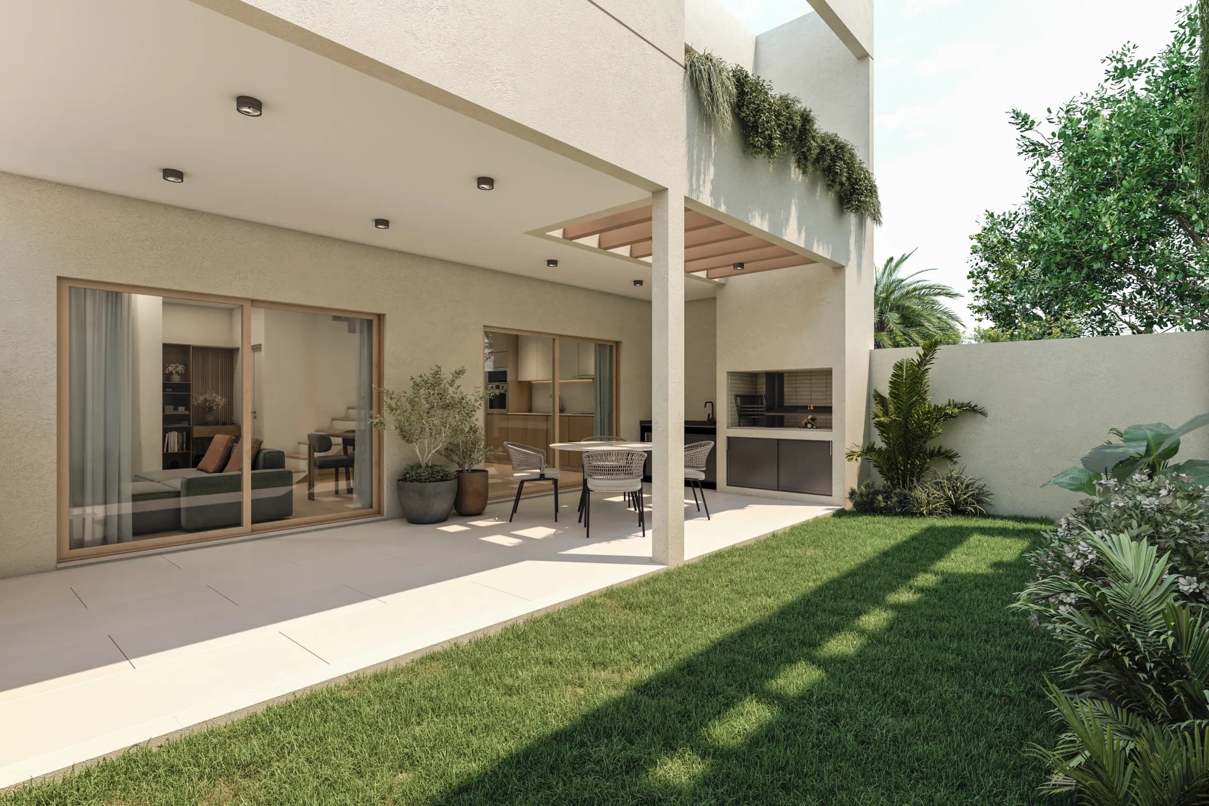 Galería con parrilla y jardín privado de una vivienda